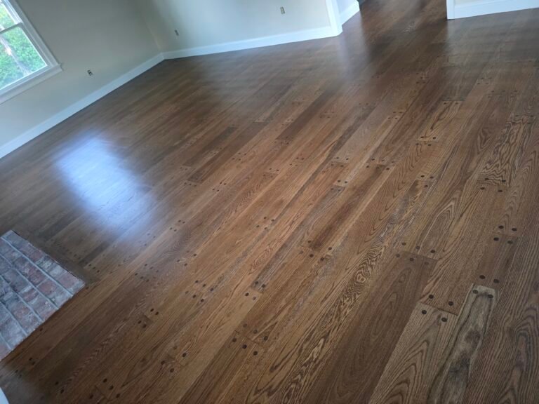 Hardwood floor with brown stain and finished surface — I&P Flooring project