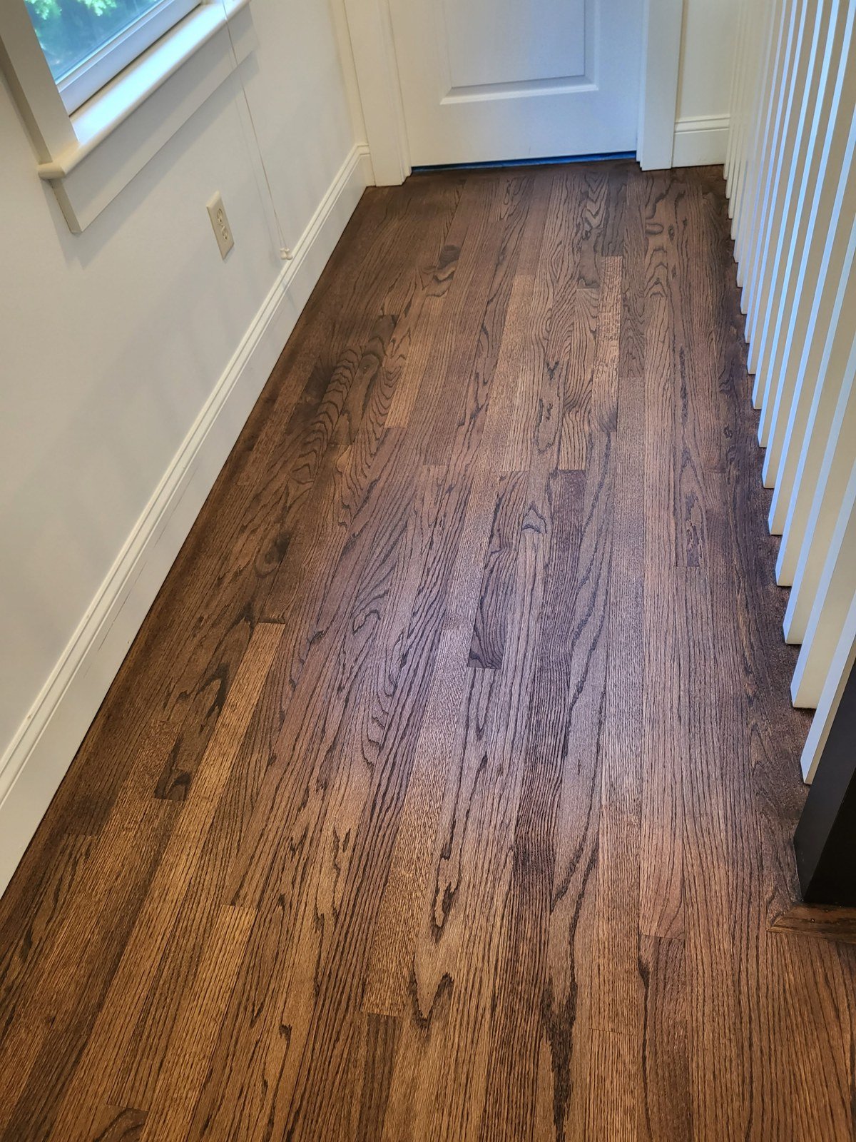 Finished dark wood floor — I&P Flooring project