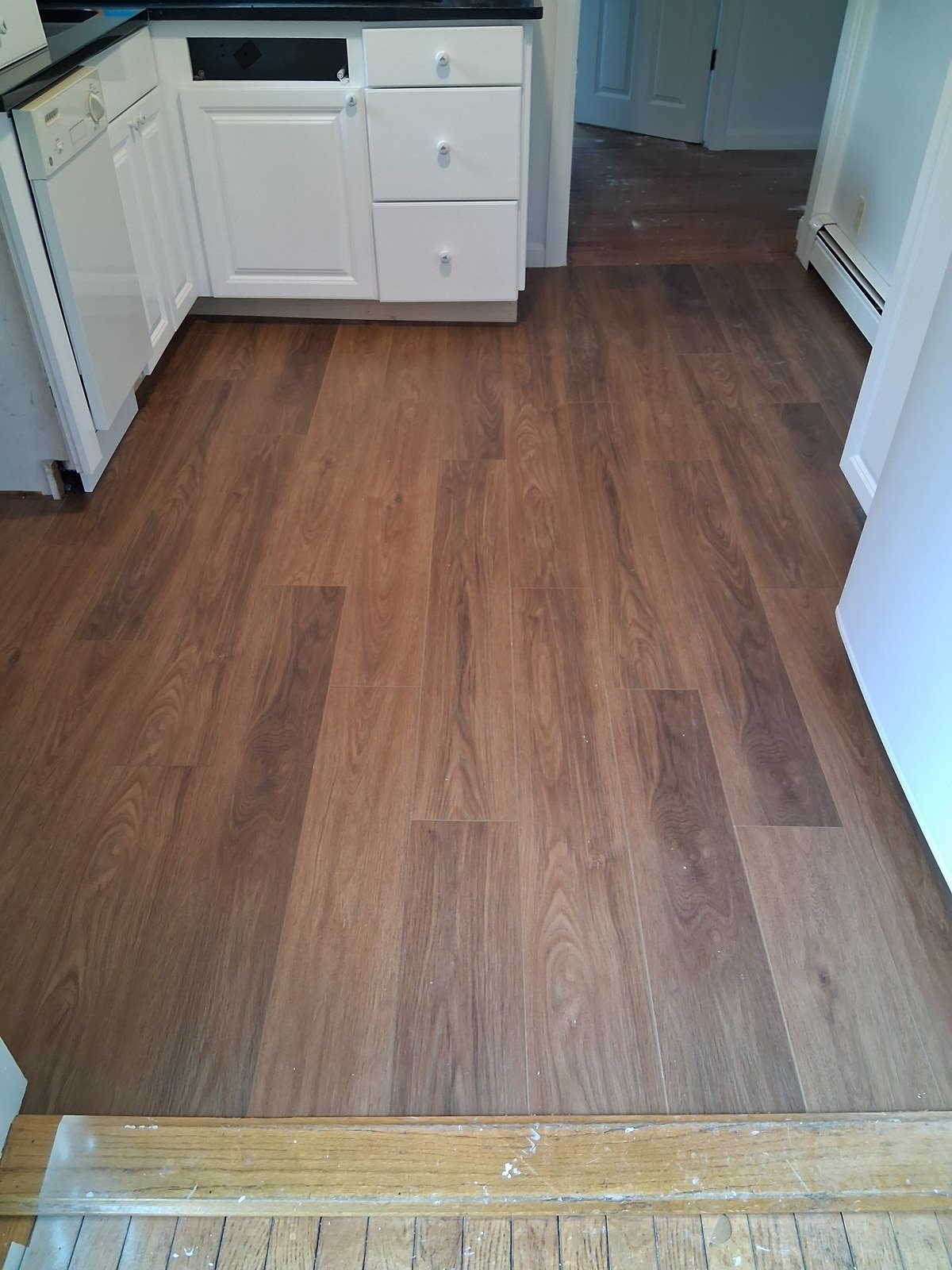Flooring installation in a kitchen — I&P Flooring project