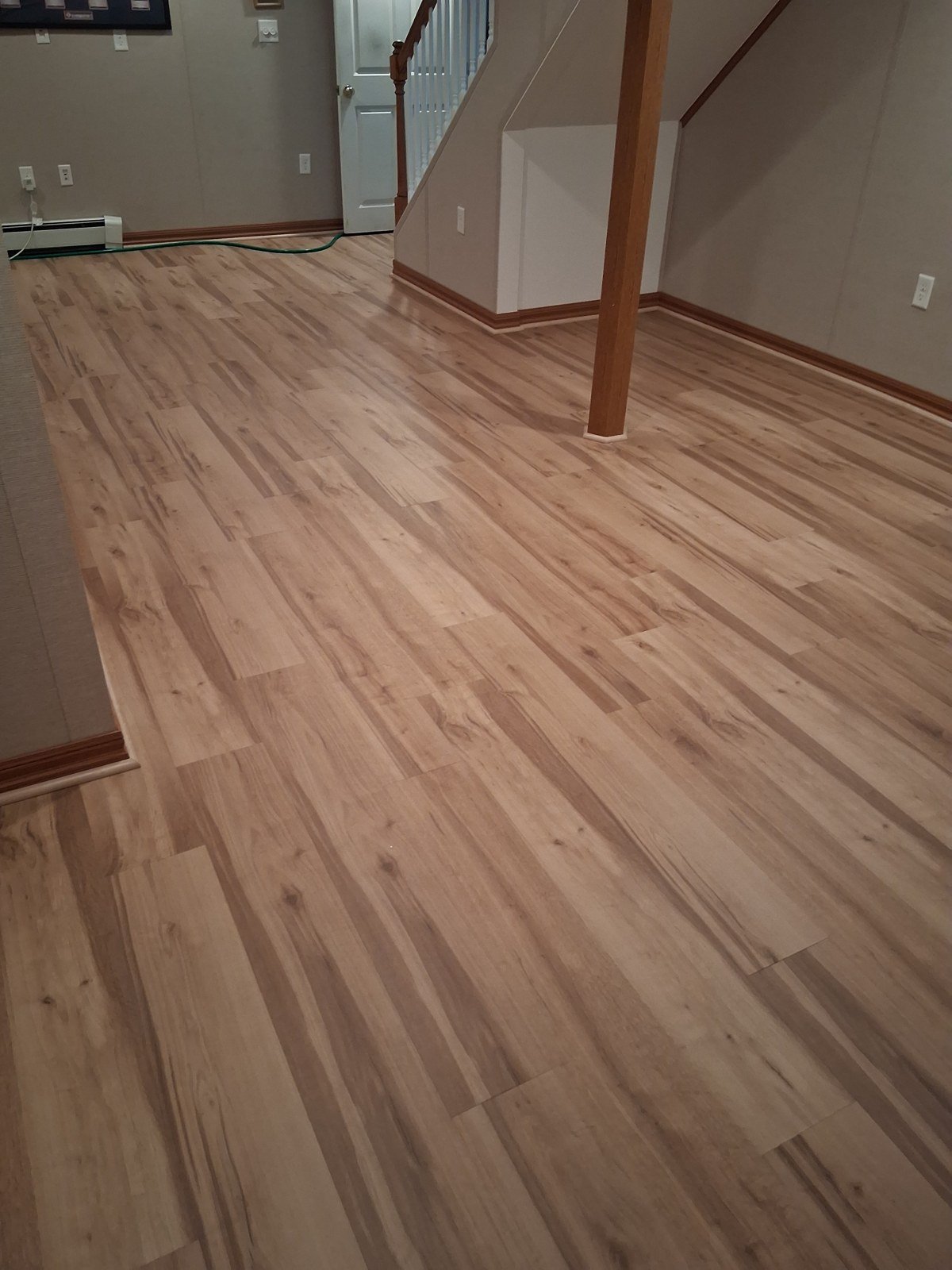 Finished wood flooring in a room — I&P Flooring project