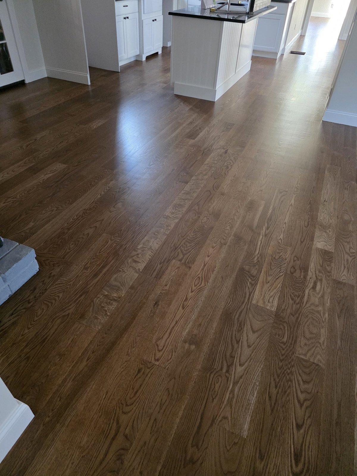 Wood staircase with brown stain — I&P Flooring project
